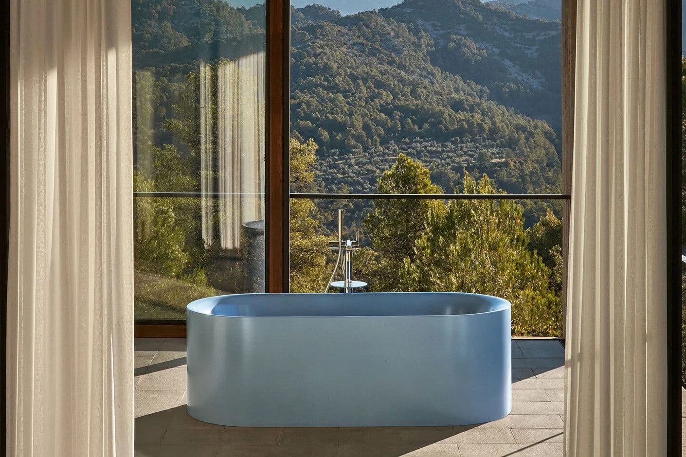 Bette — tina exenta oval en color azul claro